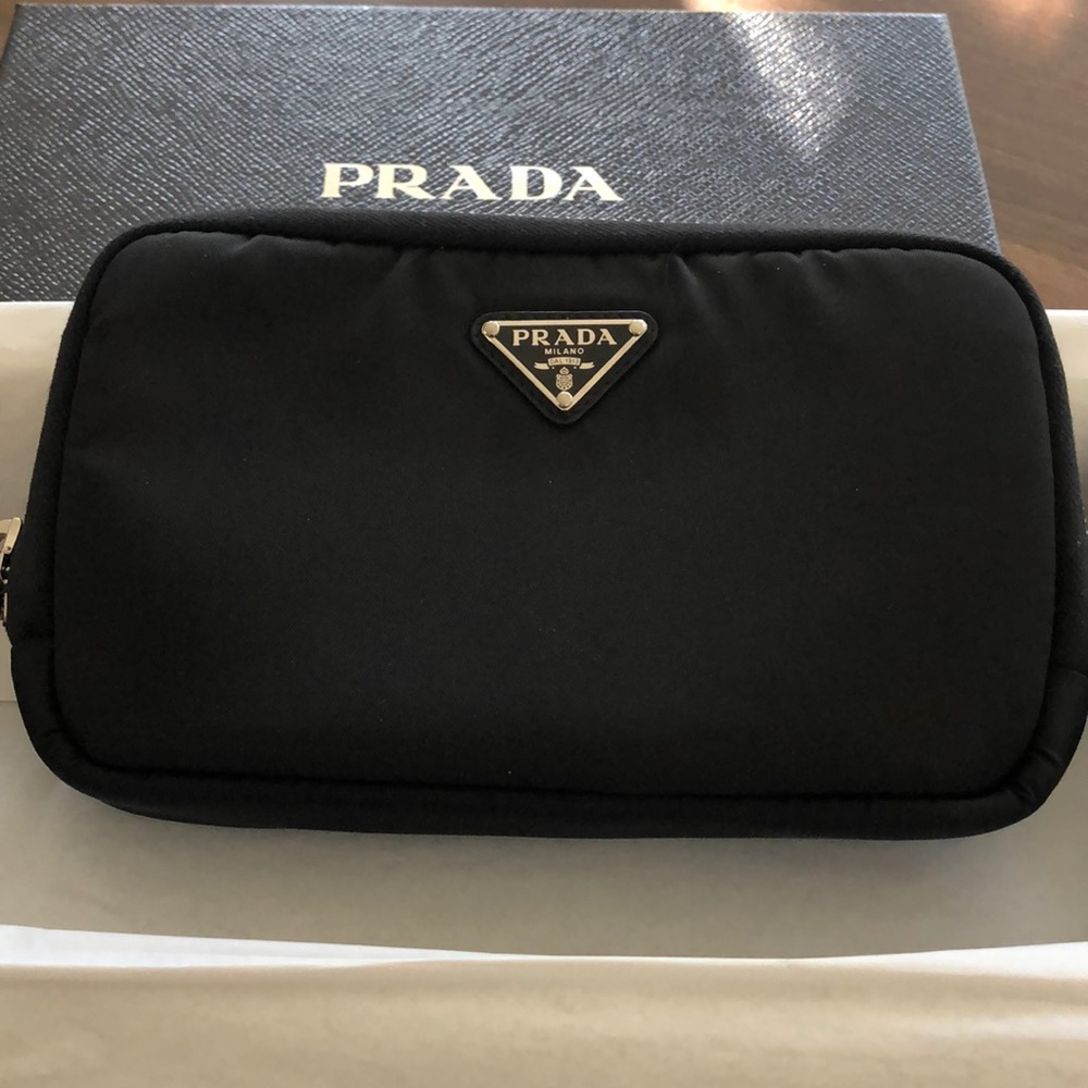 PRADA
Zipped Nylon Wallet In Black